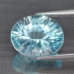 Топаз светлый sky овал 15х11мм конкейв